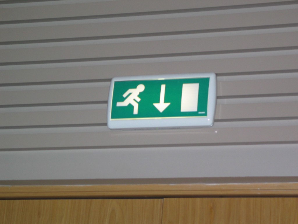 Emergency exit sign in the banquet hall at Ekebergrestauranten, Olso Emergency exit sign in the banquet hall at Ekebergrestauranten, Oslo